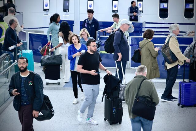 Passengers arriving at Newark Liberty International Airport in Newark, New Jersey earlier