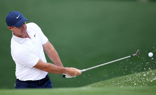 Second-ranked Rory McIlroy of Northern Ireland, the reigning Masters champion, makes a pra