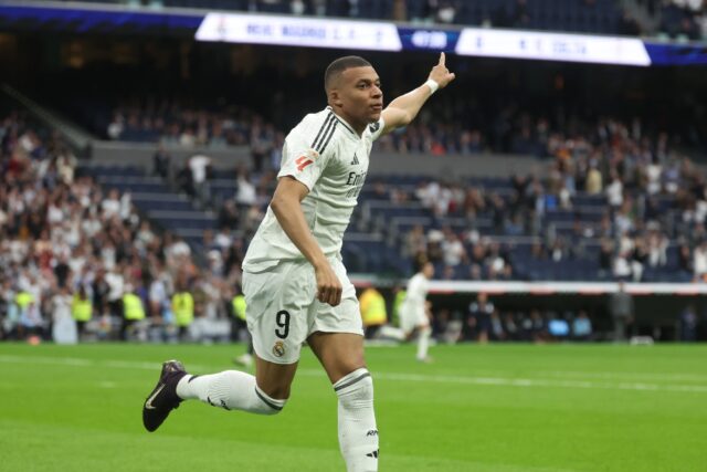Real Madrid's French forward Kylian Mbappe celebrates after scoring his second against Cel