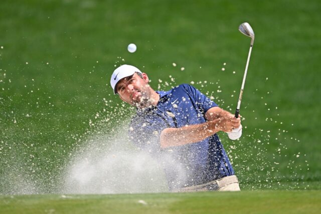 World number one Scottie Scheffler was tied with Spain's Jon Rahm as he began the back nin