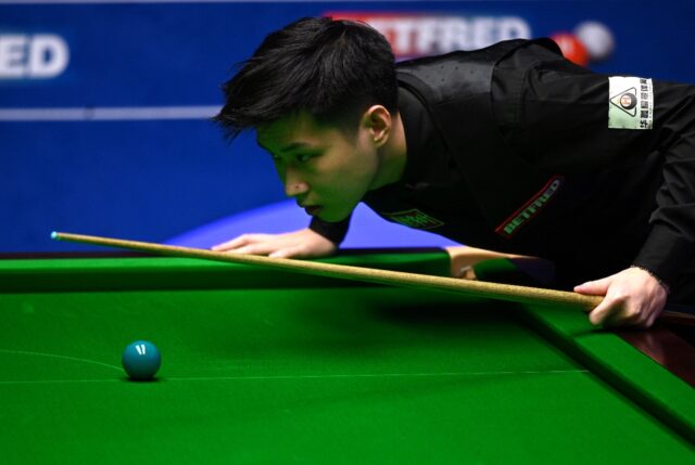 Into World Snooker final - China's Zhao Xintong