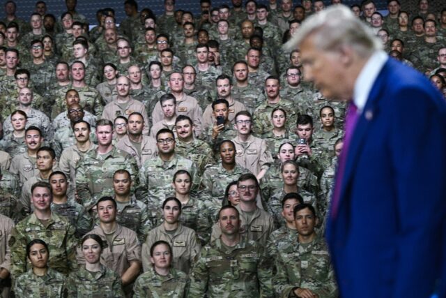 US President Donald Trump arrives to address troops at the Al-Udeid air base southwest of