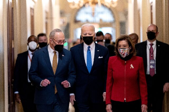 Former US President Joe Biden (C), ex-House speaker Nancy Pelosi and Senate Minority Leade