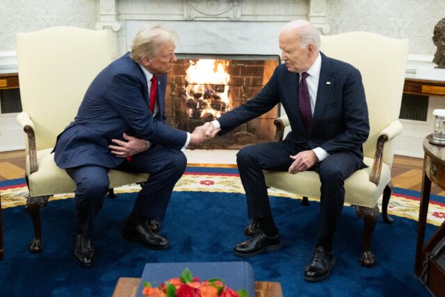 US President Joe Biden shakes hands with US President-elect Donald Trump on November 13, 2