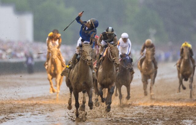 Venezuelan jockey Junior Alvarado rides Sovereignty to victory in the 151st Kentucky Derby