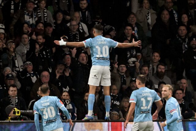 Yonatan Cohen (C) celebrates after scoring the goal which secured Melbourne City's victory