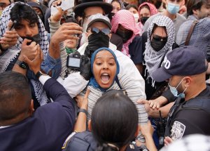 2 Columbia safety officers hurt as scores of pro-Palestinian protesters force way into lib