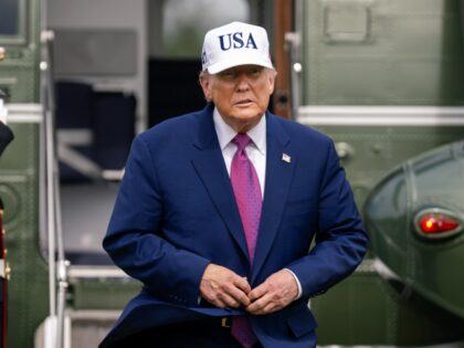 President Donald Trump departs Marine One before delivering remarks at Fort Bragg, North C