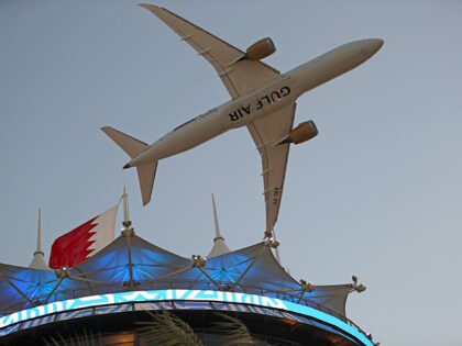 An Gulf Air airplane flies over the venue ahead of the Bahrain Formula One Grand Prix at t