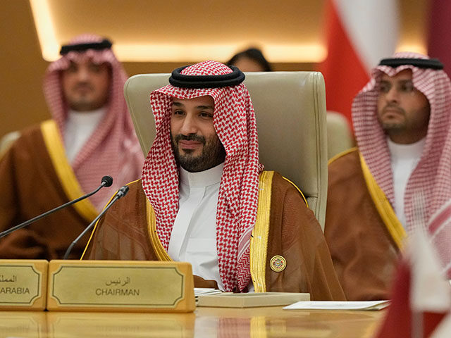 Crown Prince Mohammed bin Salman, listens to President Donald Trump speaking during the Gu