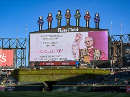 CHICAGO, ILLINOIS - MAY 9: Center Screen congratulates Pope Leo XIV before the game betwee