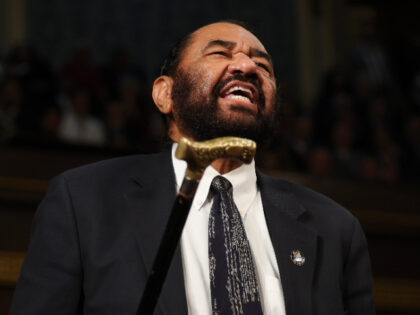 Rep. Al Green (D-TX) shouts out as U.S. President Donald Trump addresses a joint session o