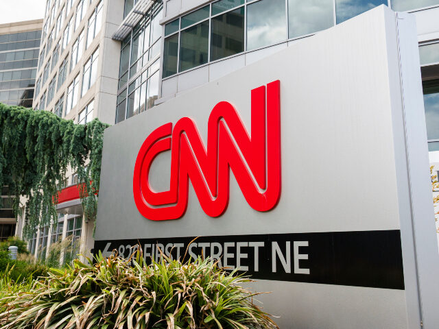 A CNN sign is displayed outside of their studios on May 18, 2025 in Washington, DC. (Kevin