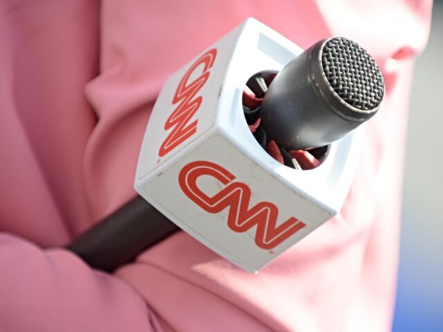 A CNN presenter is seen during the 2018 NATO Summit in Brussels, Belgium on July 11, 2018.