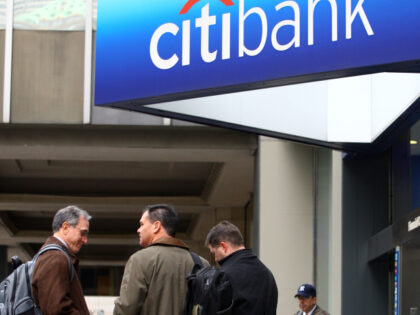 People stand outside the Citibank branch headquarters on Park Ave. on Friday, Nov .21, 200