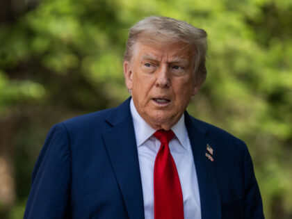 President Donald Trump is greeted by Canadian Prime Minister Mark Carney and his wife Dian