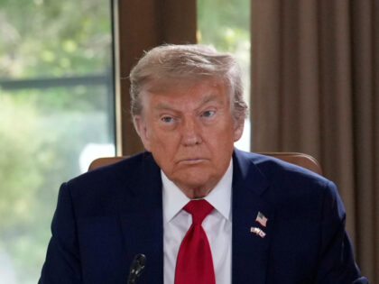 President Donald Trump, right, and Canada's Prime Minister Mark Carney participate in