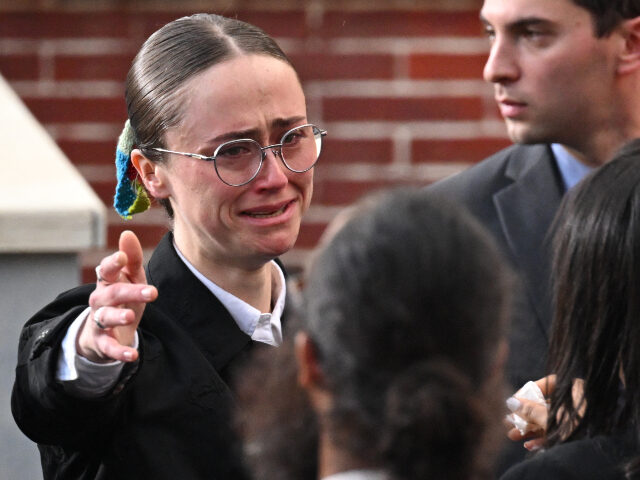 Ella Emhoff gets emotional as she reaches to hug someone after US Vice President Democrati