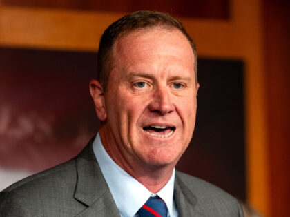 Sen. Eric Schmitt (R-MO) gestures while speaking during a news conference on Capitol Hill