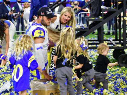 Los Angeles Rams' quarterback Matthew Stafford reacts with wife Kelly Hall and family