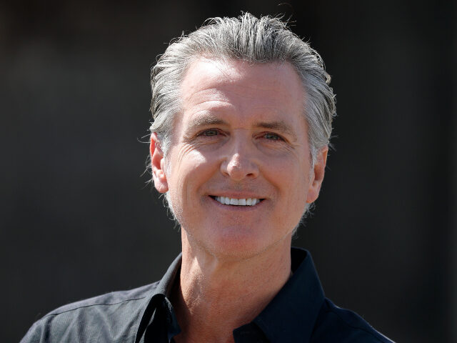 California Governor Gavin Newsom speaks during a news conference at Gemperle Orchard on Ap