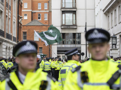LONDON, UNITED KINGDOM - APRIL 10: Police officers take security measures as people stage