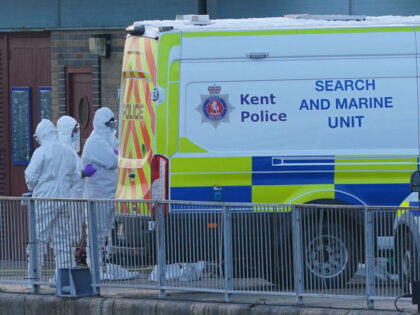 Police Forensic officers at the RNLI station at the Port of Dover after a large search and