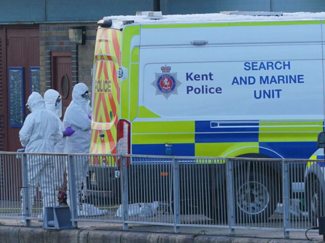 Migrant Channel crossing incidents Police Forensic officers at the RNLI station at the Port of Dover after a large search and