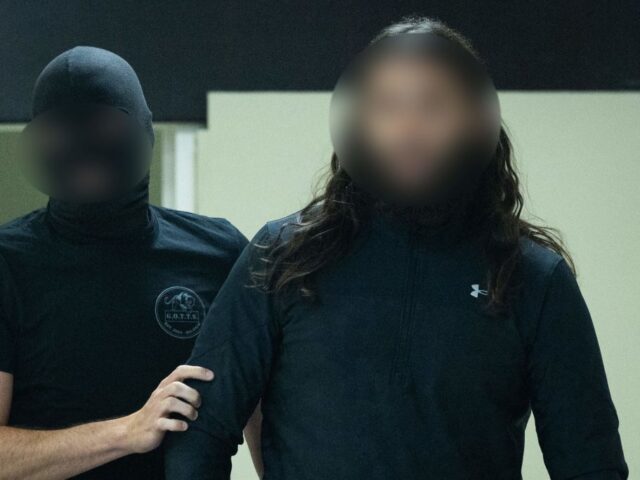 *** Attention all users - refiling with blurred accused*** Accused Osama Krayem arrives f