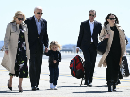 (L_R) US First Lady Jill Biden, President Joe Biden, their grandson Beau Biden, son Hunter