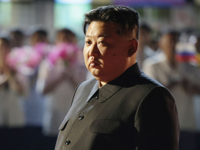 In this pool photograph distributed by the Russian state agency Sputnik, North Korea's lea