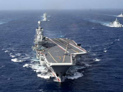 The formation of Chinese aircraft carrier Liaoning carry out a regular real-combat trainin