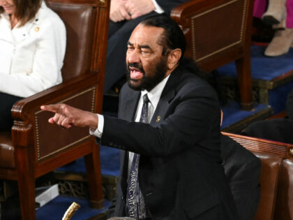 US Representative Al Green (D-TX) shouts as US President Donald Trump speaks during an add
