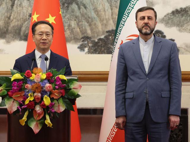 GettyImages-2204429468 TOPSHOT - (L-R) Russian Deputy Foreign Minister Sergei Ryabkov, China's Executive Vice Min