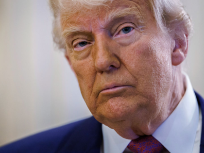 US President Donald Trump arrives for a House Republican caucus meeting at the US Capitol
