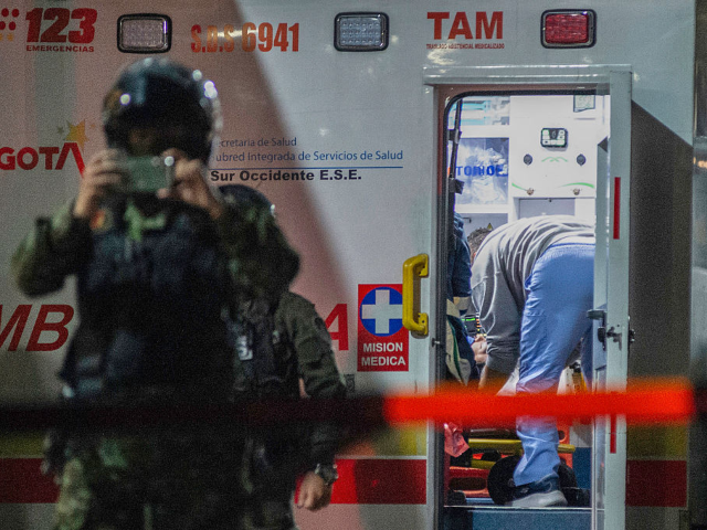 GettyImages-2218511833 TOPSHOT - Senator Miguel Uribe Turbay receives medical treatment in an ambulance after bei