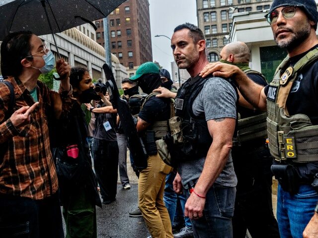 USA-ICE-PROTEST-26-FEDERAL-PLAZA Protestors and ICE agents stand face to face in a tense standoff outside 26 Federal Plaza