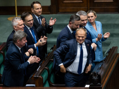 Poland's Prime Minister Donald Tusk reacts after the voting of confidence for his cabinet,