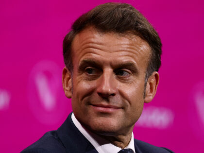 France's President Emmanuel Macron speaks during a round table discussion as part of his v