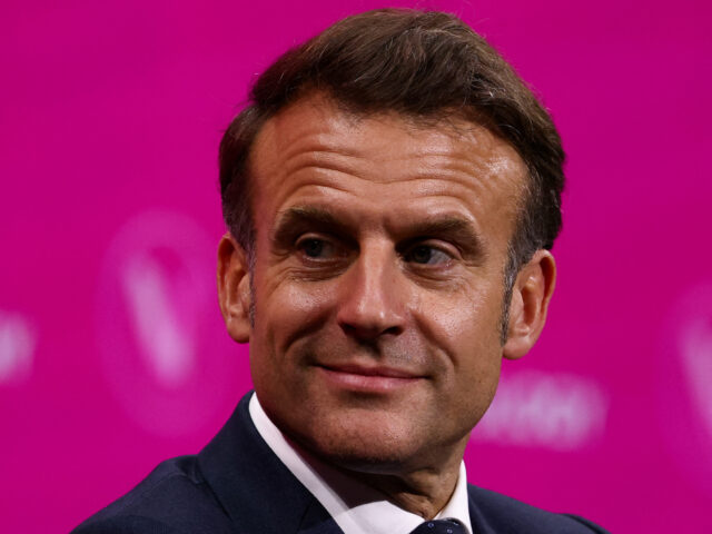 France's President Emmanuel Macron speaks during a round table discussion as part of his v