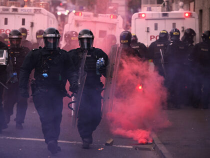 BALLYMENA, NORTHERN IRELAND - JUNE 11: PSNI officers in riot gear respond to a third night