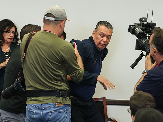 US Senator Alex Padilla, Democrat from California, is removed from the room after interrup