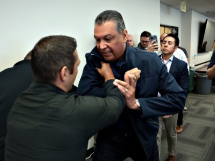 Los Angeles, CA - May 05: California Democratic Senator Alex Padilla attempts to get acc