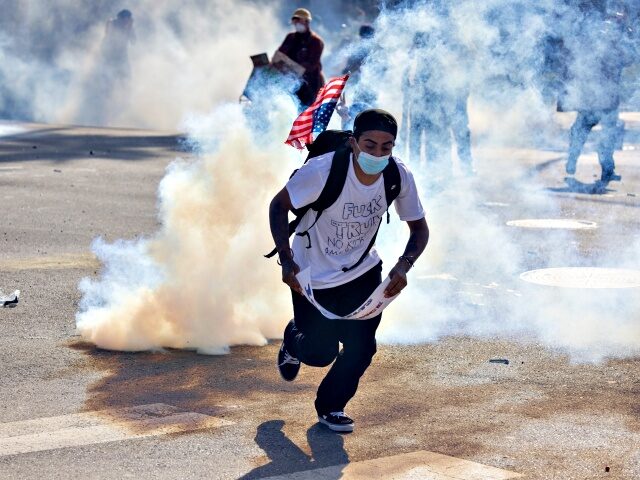 LOS ANGELES, CALIFORNIA - JUNE 14: Sheriff deputies repeatedly shoot people with less-than