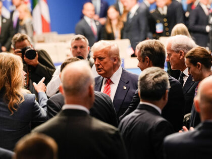 US President Donald Trump, center, during the North Atlantic Treaty Organization (NATO) su