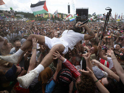 Bobby Vylan of British duo Bob Vylan crowd surfing while performing on the West Holts Stag