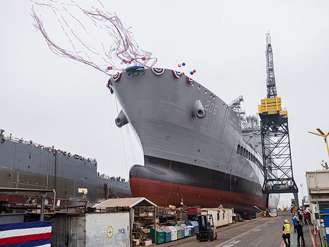USNS Harvey Milk departs the General Dynamics NASSCO shipyard after a ceremonial address i