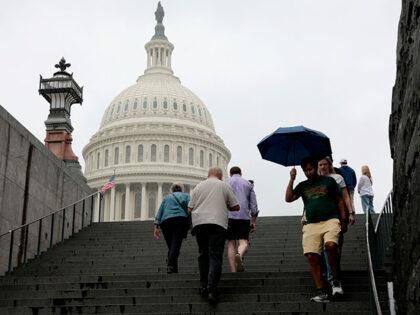 Tourists walk near the U.S. Capitol visitor center on June 16, 2025 in Washington, DC. Sen