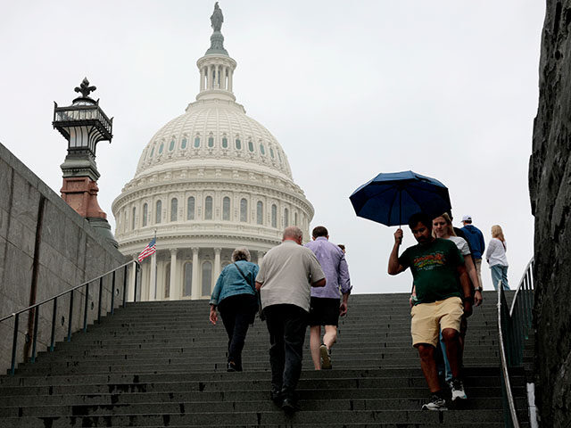 Tourists walk near the U.S. Capitol visitor center on June 16, 2025 in Washington, DC. Sen