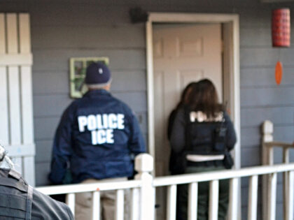 In this Feb. 9, 2017, photo provided U.S. Immigration and Customs Enforcement, ICE agents